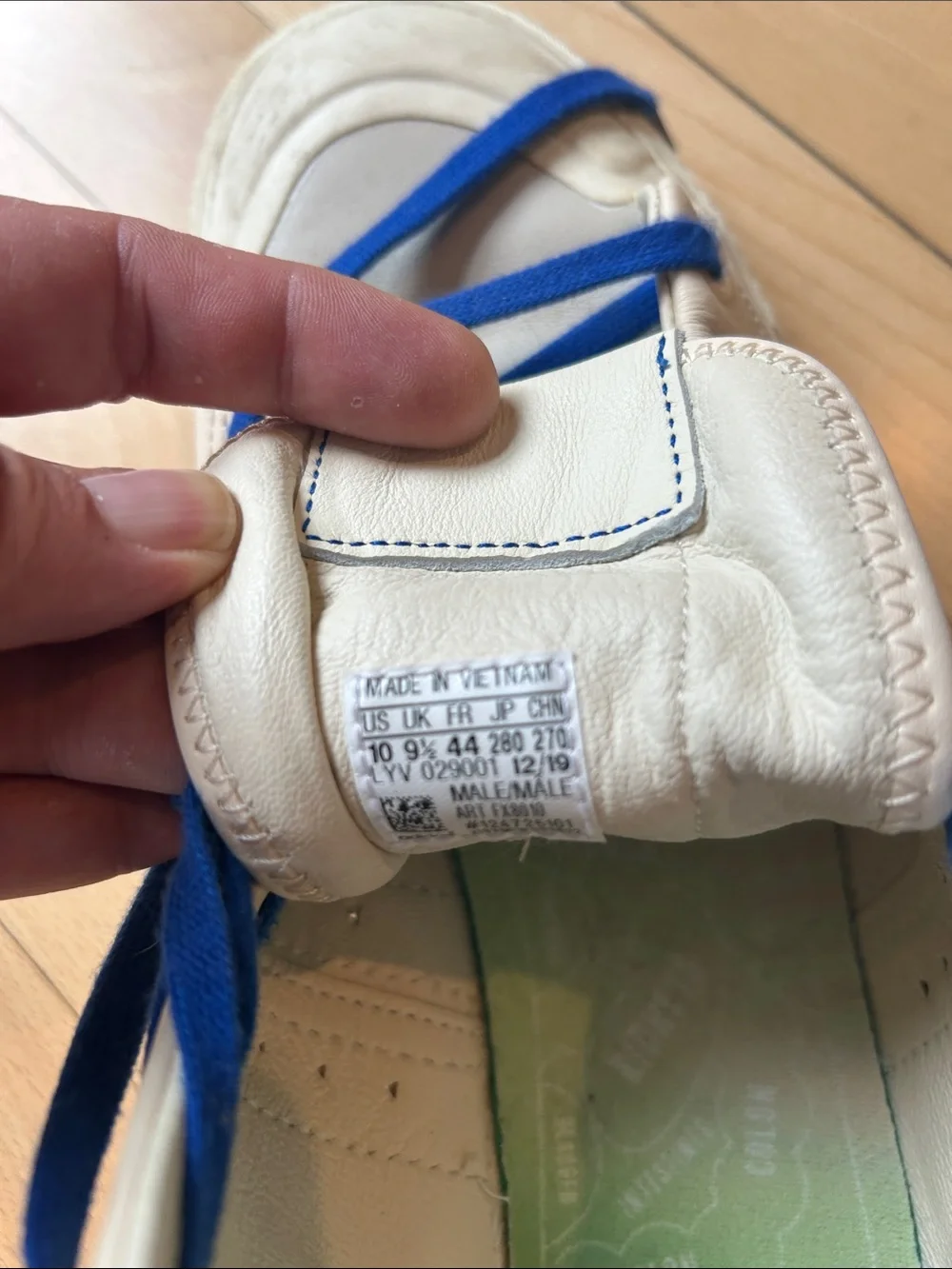 adidas human race White High-Top Sneakers